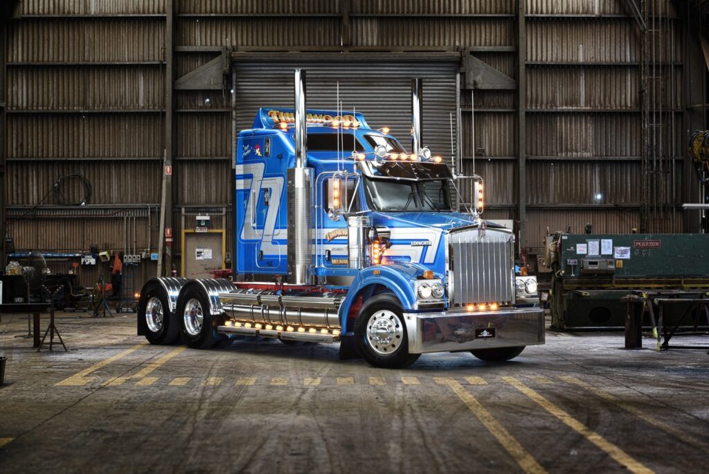 Terry Thurwood’s blue Kenworth T409SAR Just Crackin in a workshop