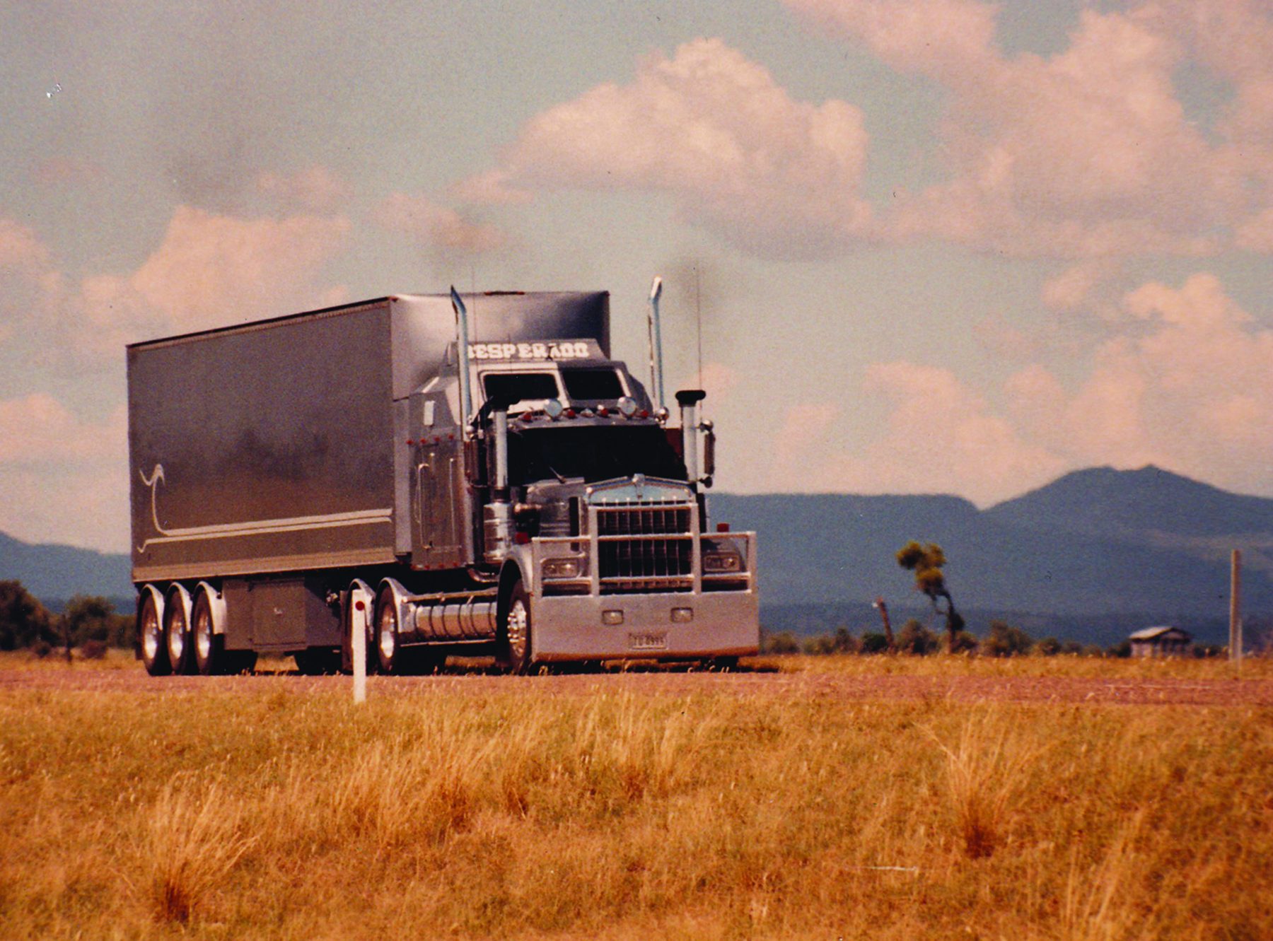 The Desperado Kenworth and trailer photographed in open country
