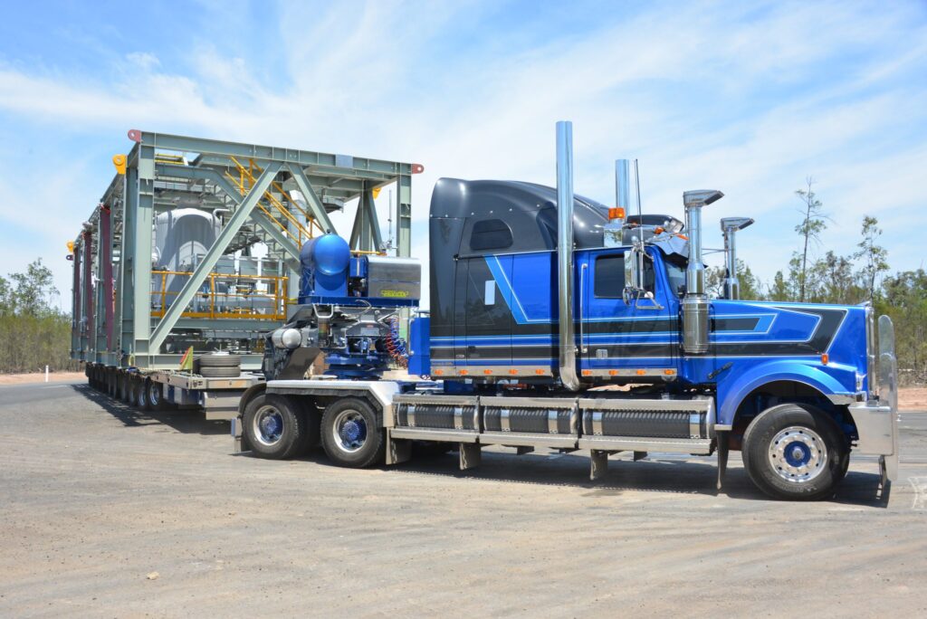Heavy Haulage Australia’s blue Western Star 6900 Butch Cassidy carrying a large industrial load