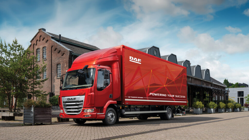 Red DAF XB box-bodied truck in manufacturer promotional imagery.