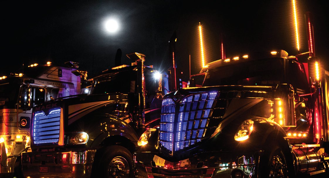 N J Woods’ International Lonestar and Mack Superliner under the light of a full moon.